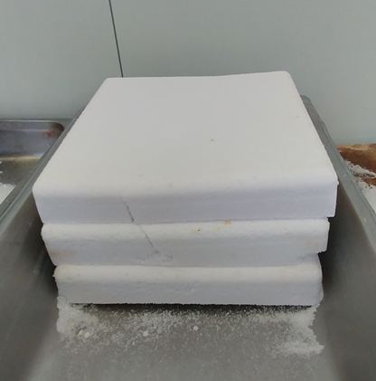 Calcined calcium raw material blocks prior to milling into powder